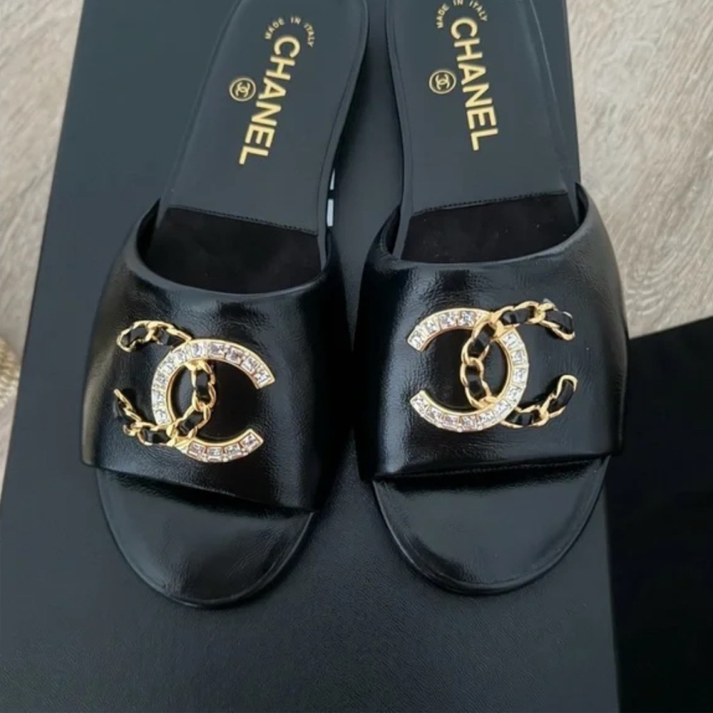 Sold Chanel Elegant Black Sandals with Gold Chain